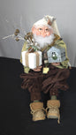 Elf Doll Holding Present and Tin House