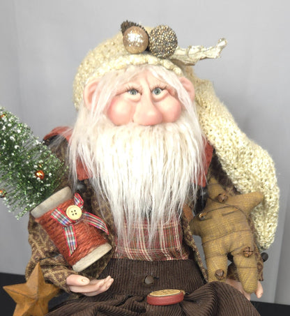 Santa Doll Holding Christmas Tree and Stuffed Prim Star