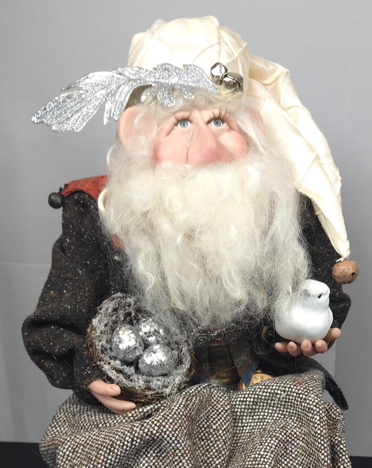 Santa Doll Holding a Nest of Eggs and White Dove