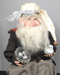 Santa Doll Holding a Nest of Eggs and White Dove