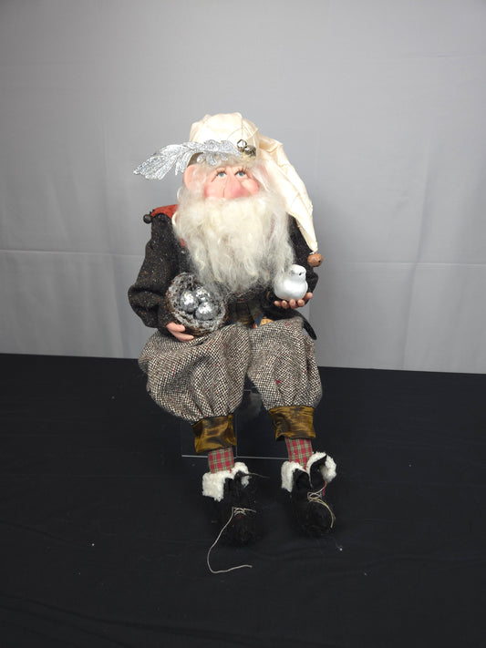 Santa Doll Holding a Nest of Eggs and White Dove