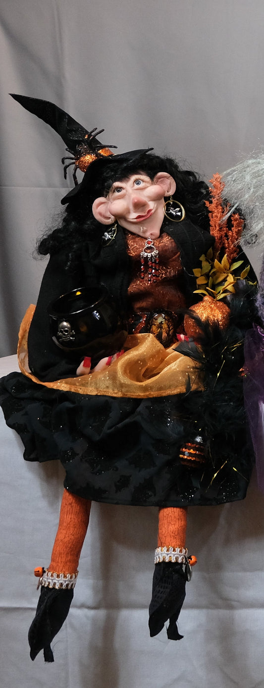 Witch Doll Holding Cauldron and Pumpkin