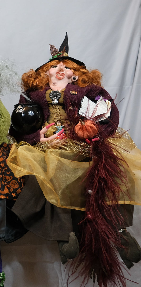 Witch Doll with Red Hair Holding Cauldron and Pumpkin
